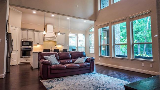 Living Room; Enjoy the towering trees from the comfort of your living room | Image 10