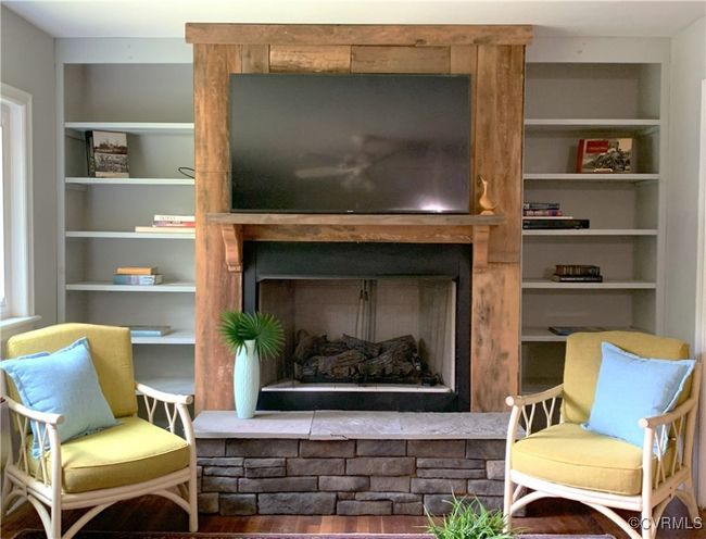 Stone hearth and built-in bookshelves | Image 5