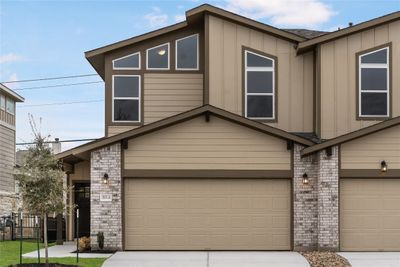 20503A Tractor Drive, Townhouse with 3 bedrooms, 2 bathrooms and 2 parking in Pflugerville TX | Image 1