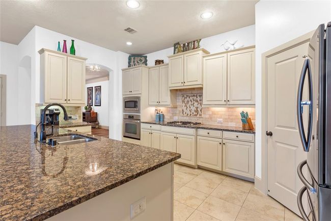 31025 Sunfall Trail Ln, House other with 4 bedrooms, 4 bathrooms and 3 parking in Spring TX | Image 9