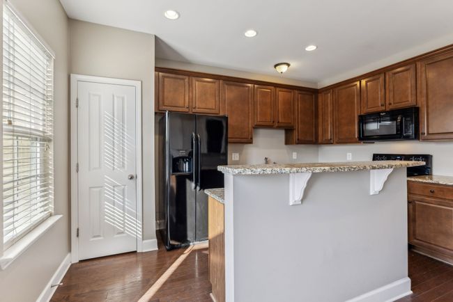 Nice size pantry and snack area at island | Image 21