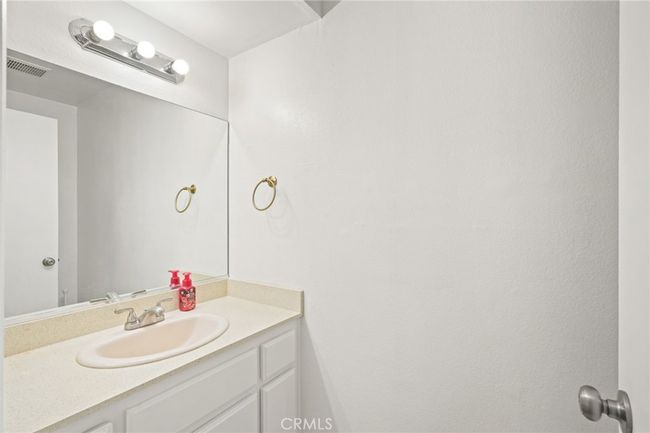 Downstairs: 1/2 bathroom | Image 8