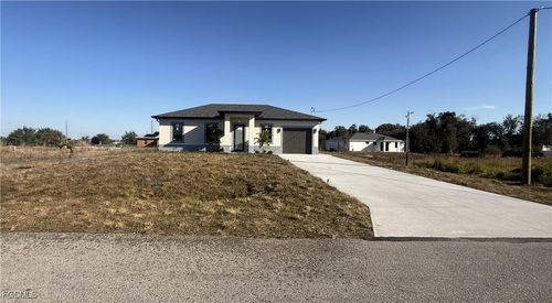 383 Pennfield Ave, LEHIGH ACRES, FL, 33974-9833 | Card Image