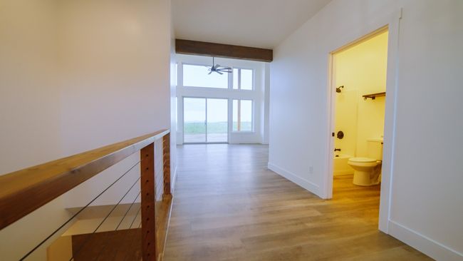 Hallway with wood finished floors | Image 24