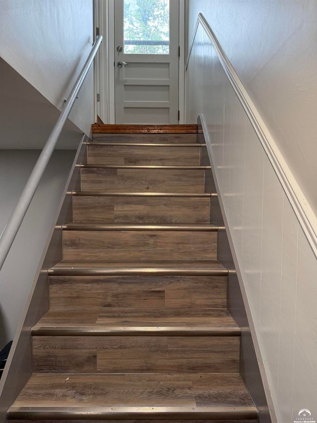One could use that door to the back yard as a secret entrance to the finished daylight basement. | Image 33