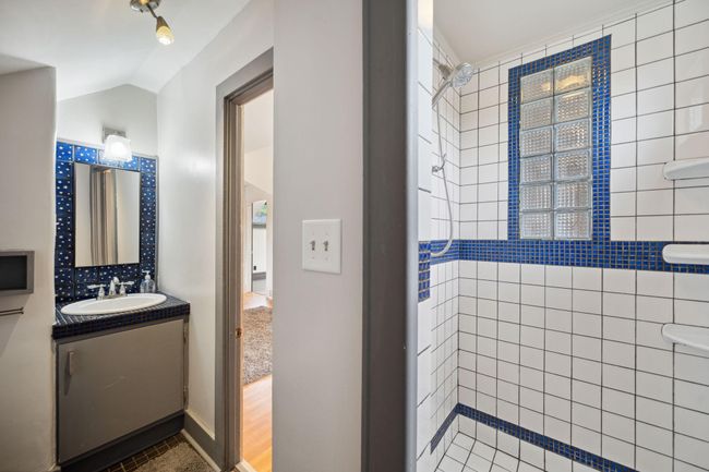 Upper level 3/4 bath with tile shower | Image 18