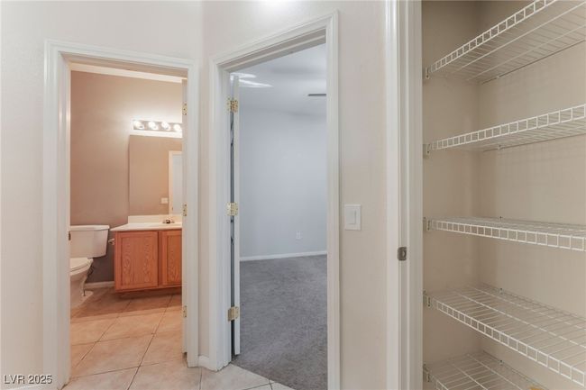 Closet featuring a sink | Image 42