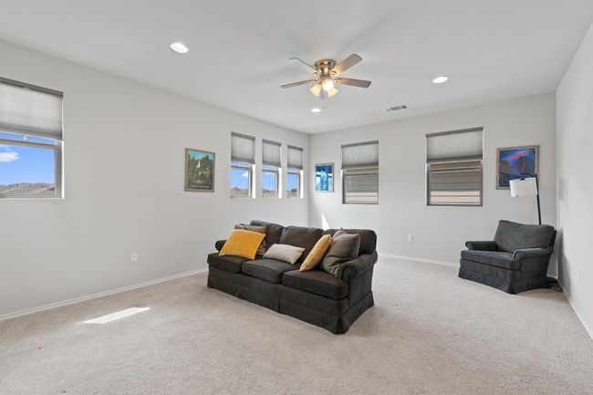 This upstairs additional living area | Image 19