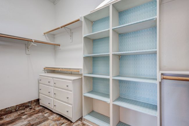 Walk in closet with hardwood / wood-style floors | Image 16