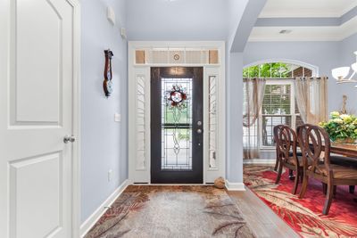 Foyer entrance featuring hardwood / wood-style floors and ornamental molding | Image 3