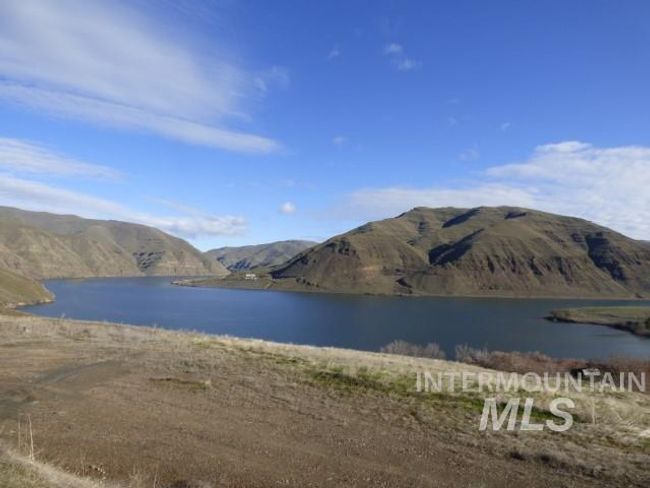 Water view with a mountain backdrop | Image 4
