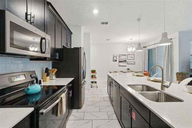 1570 Sandbagger Dr, Townhouse with 4 bedrooms, 3 bathrooms and null parking in DAVENPORT FL | Image 11