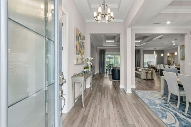 Custom entry door and Shaw LVP flooring throughout | Image 4