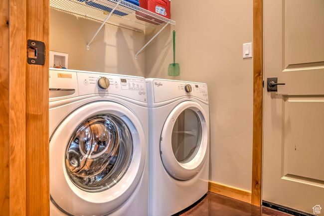 Washroom with washing machine and dryer | Image 12