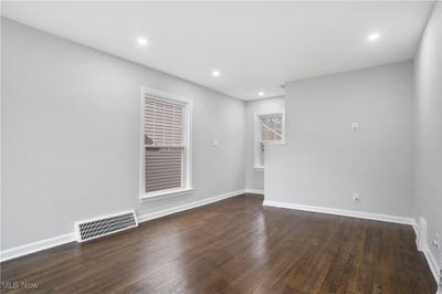 Empty room featuring dark hardwood / wood-style flooring | Image 3