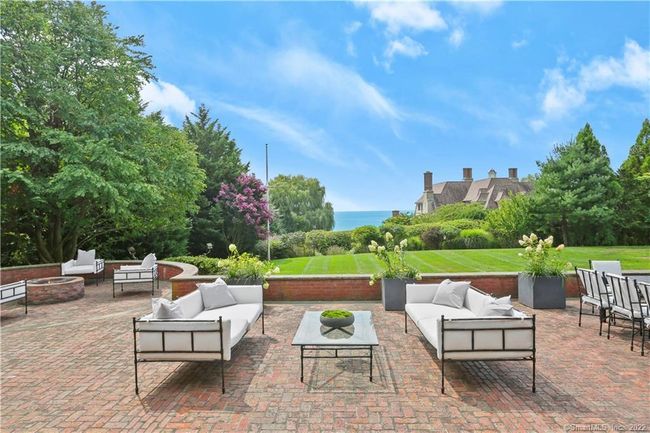 TERRACE // Entertain on a grande scale with fire pit, views and calming ocean breeze. | Image 31