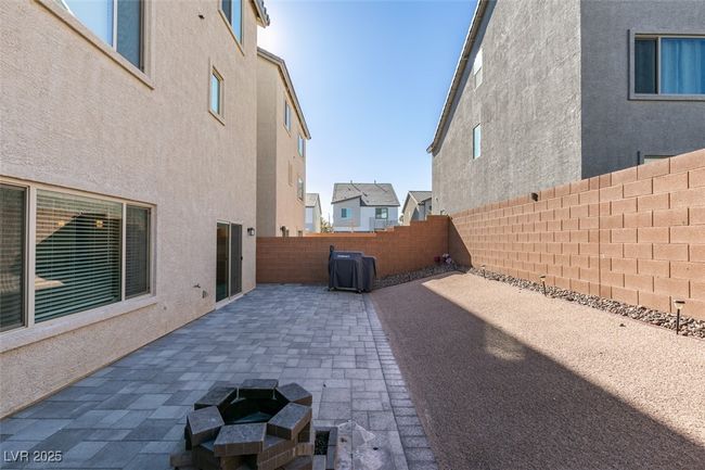 View of patio / terrace featuring an outdoor fire pit and a fenced backyard | Image 38
