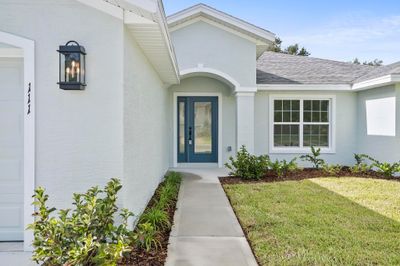 111 Bird Of Paradise Dr, House other with 3 bedrooms, 2 bathrooms and null parking in Palm Coast FL | Image 3