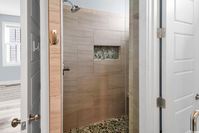 Full bath featuring a tile shower | Image 27