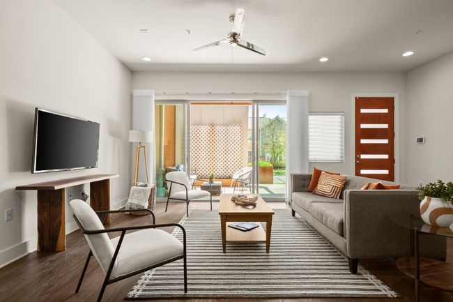 Living area featuring a ceiling fan, wood finished floors, recessed lighting, and baseboards | Image 5