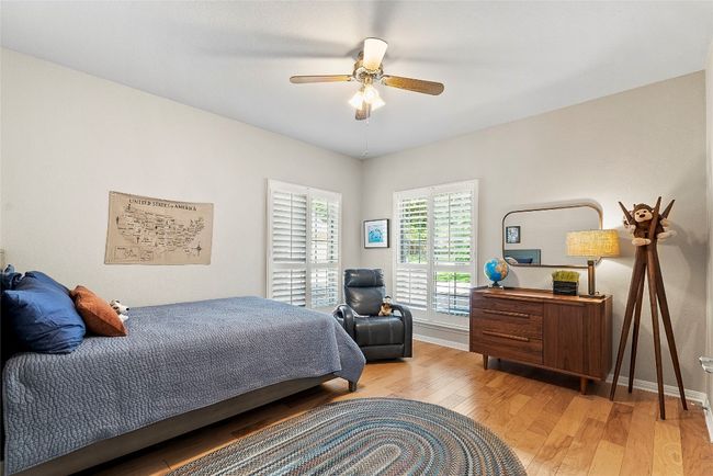 The guest bedrooms are generously sized, each featuring walk-in closets and plenty of natural light | Image 25