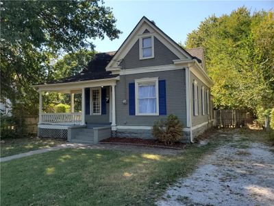 View of front of home with a front yard and a porch | Image 2