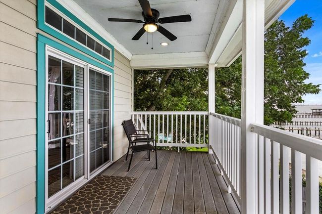 Step outside the primary bedroom and discover a spacious second-floor balcony—an inviting oasis designed for relaxation and inspiration. | Image 33