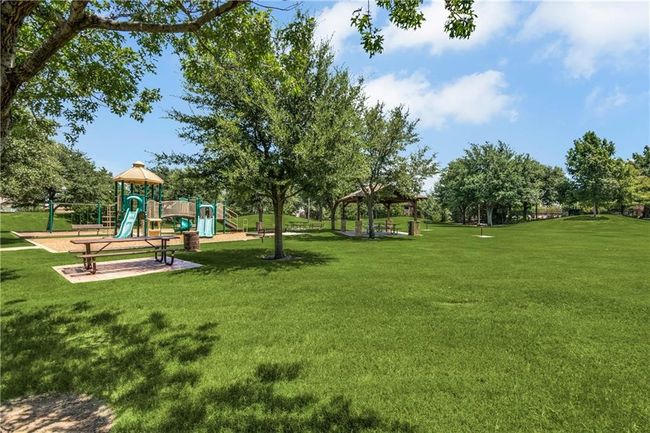 View of home's community featuring a lawn and a gazebo | Image 27