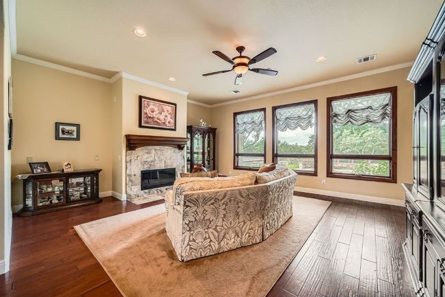 Main living area is inviting w/plentiful natural light | Image 8