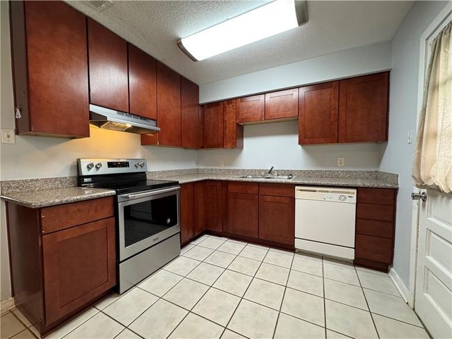 Plenty cabinets in the kitchen | Image 9