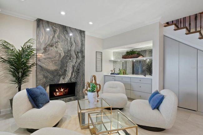 Formal Living space with fireplace | Image 31