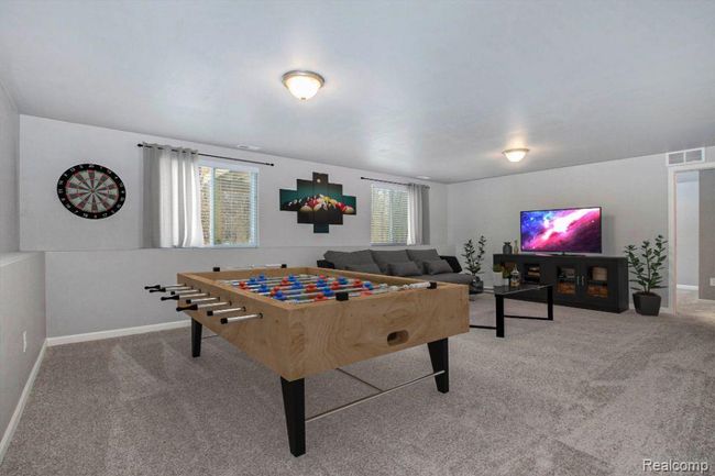 Virtually staged- rec room lower level | Image 31