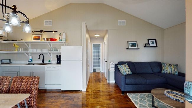 Unit B - High ceilings with Open living between kitchen and living room. | Image 12