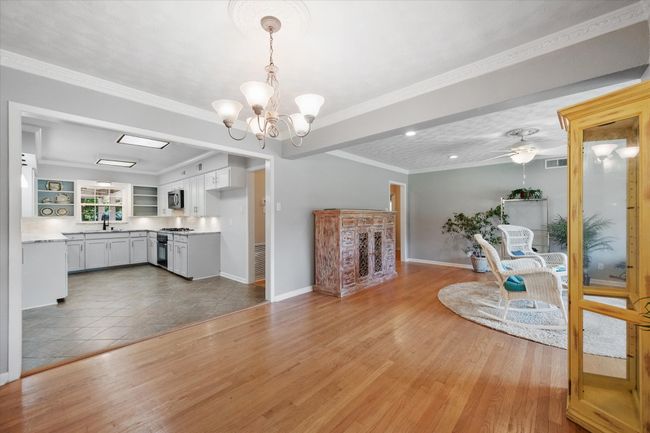 Open living, dining and kitchen area | Image 8