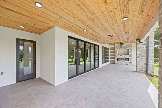 Patio, outdoor dining area and living area | Image 37