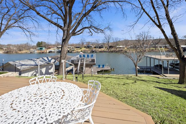Dock area featuring a yard and a water view | Image 17