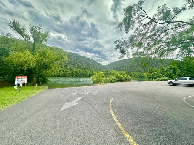 View of boat ramp featuring a lake and mountain view | Image 8