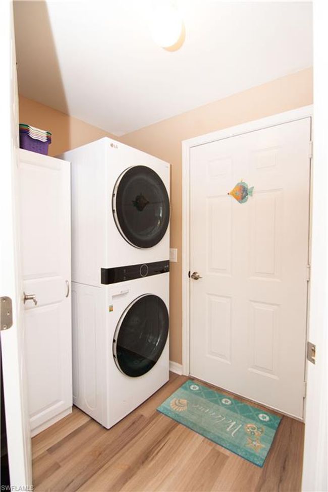 Stackable Washer and Dryer with Storage Cabinet as you enter in from the attached 1 car garage. | Image 27