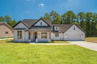 Be the first to occupy this brand new charming home that offers 3 spacious bedroom, 3 full baths and a huge EXTRA room with endless opportunities from a home office to gym to game room, to guest quarters. | Image 1