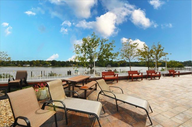 View of patio / terrace with a water view and outdoor dining area | Image 26