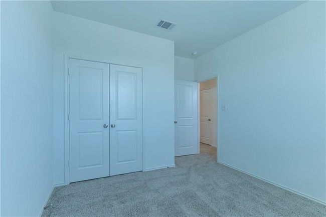 Unfurnished bedroom featuring carpet floors and a closet | Image 24