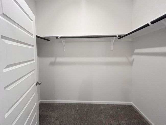 Owner's Suite Walk-in Closet. Home under construction. Sample floor plan photo used for illustrative purposes only. Upgrades, selections options, windows and colors may vary. | Image 15