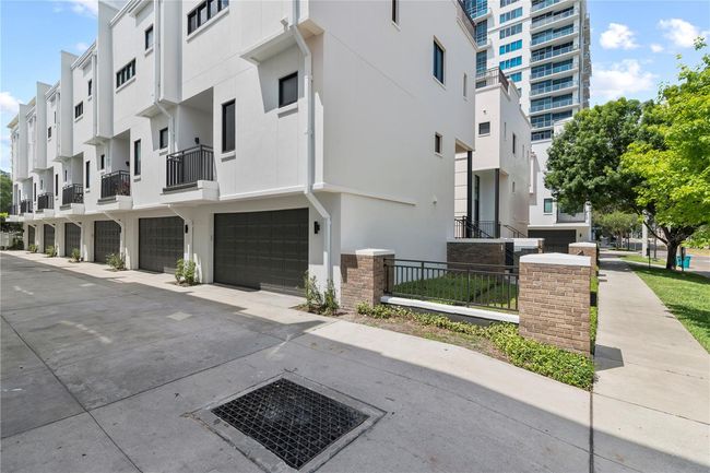 TWO-CAR GARAGE ENTRANCE FROM REAR OF CONDOMINIUM UNIT | Image 37