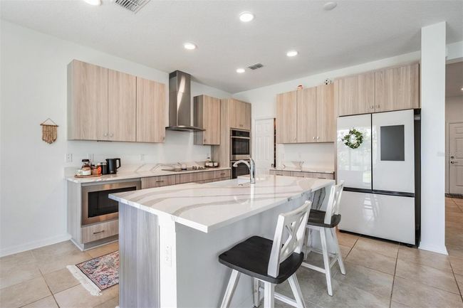 7517 Notched Pine Bnd, House other with 4 bedrooms, 3 bathrooms and null parking in WESLEY CHAPEL FL | Image 31