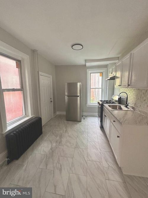 311 Rev S Howard Woodson Jr Way, Trenton, NJ, 08618-4711 | Card Image