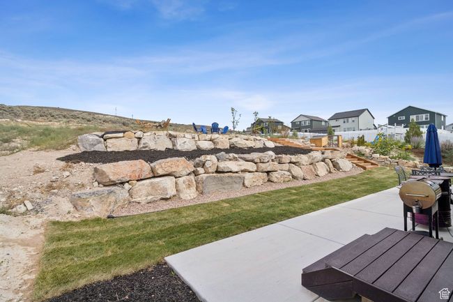 View of yard with a patio and a residential view | Image 6