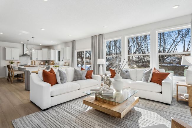 Photo is of the actual model. The main level is the perfect spot for hosting friends and family. | Image 8