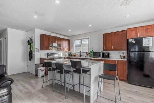 3702 Dover Ridge Drive Se, Home with 5 bedrooms, 2 bathrooms and 4 parking in Calgary AB | Image 2