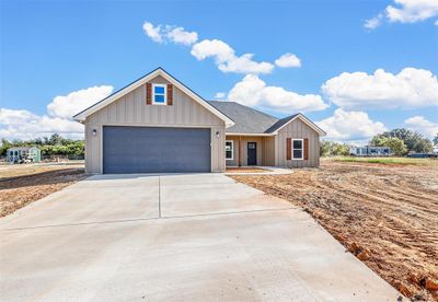 View of front of property featuring a garage | Image 3