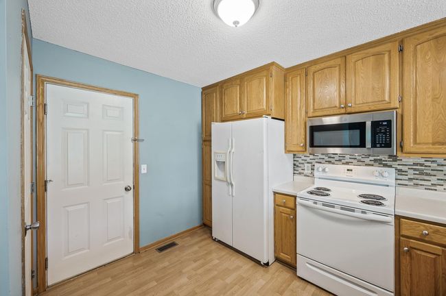 1011 6 Th Ave Ne, Townhouse with 3 bedrooms, 4 bathrooms and null parking in Buffalo MN | Image 6